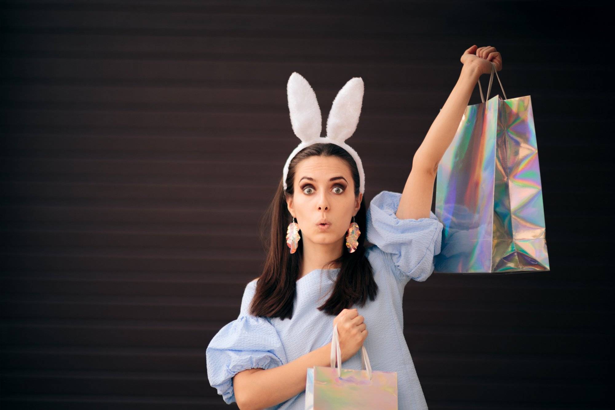 Woman with Easter Bunny Ears Holding Shopping Bags Woman with Easter Bunny Ears Holding Shopping Bags